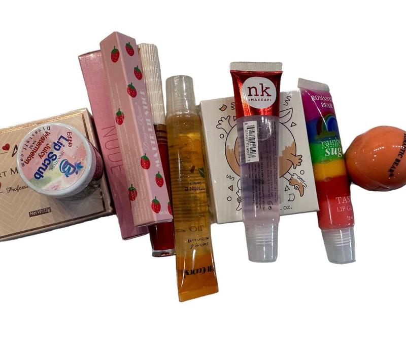 Lip Lover's Kit In Reds, 10 Lip Products, 1 Lip Balm, 1 Lip Scrub, Several Lip Glosses Clear or Tinted and Several Lip Products in Shades of Red, Lip Plumpers, Lip Glosses, Lip Sticks, Lip Pencils, Lip Creams, Lip Butters, Lip Stains Skincare Lipstick